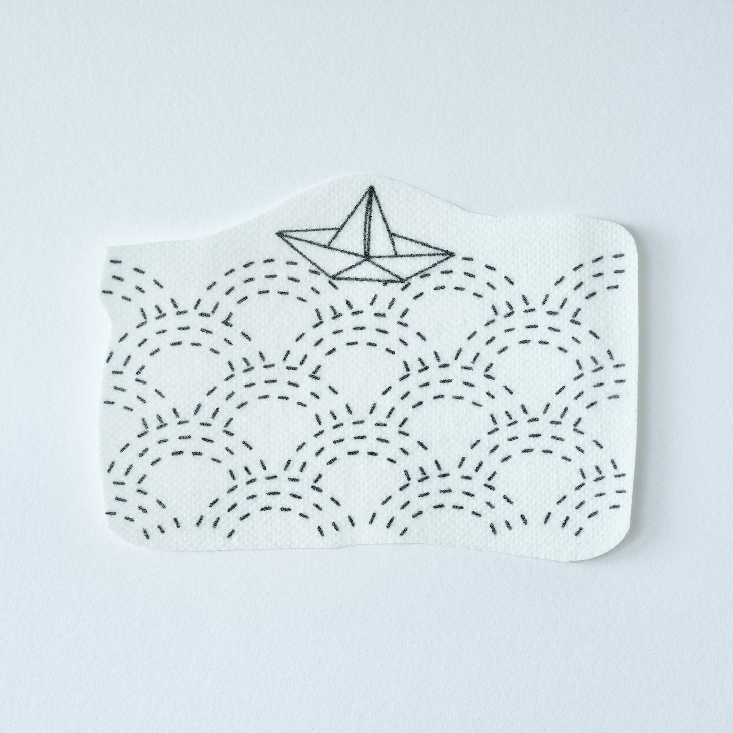 a boat for B sashiko sticker featuring wave pattern 