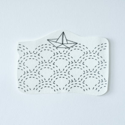 a boat for B sashiko sticker featuring wave pattern 