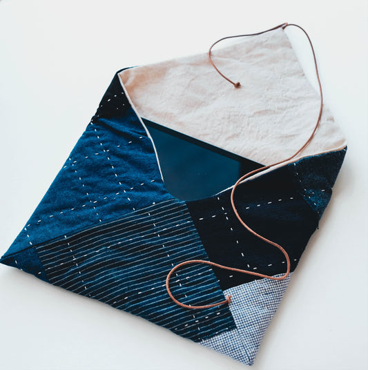 Hand-stitched Boro patchwork tablet sleeve made from vintage indigo fabrics.