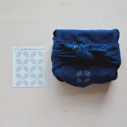 Flower Diamond Sashiko pattern sheet and a sample stitched on an indigo Furoshiki gift wrap.