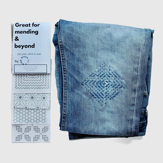 Great for Mending & Beyond Sashiko set with Persimmon Flower pattern sampled on blue jeans.