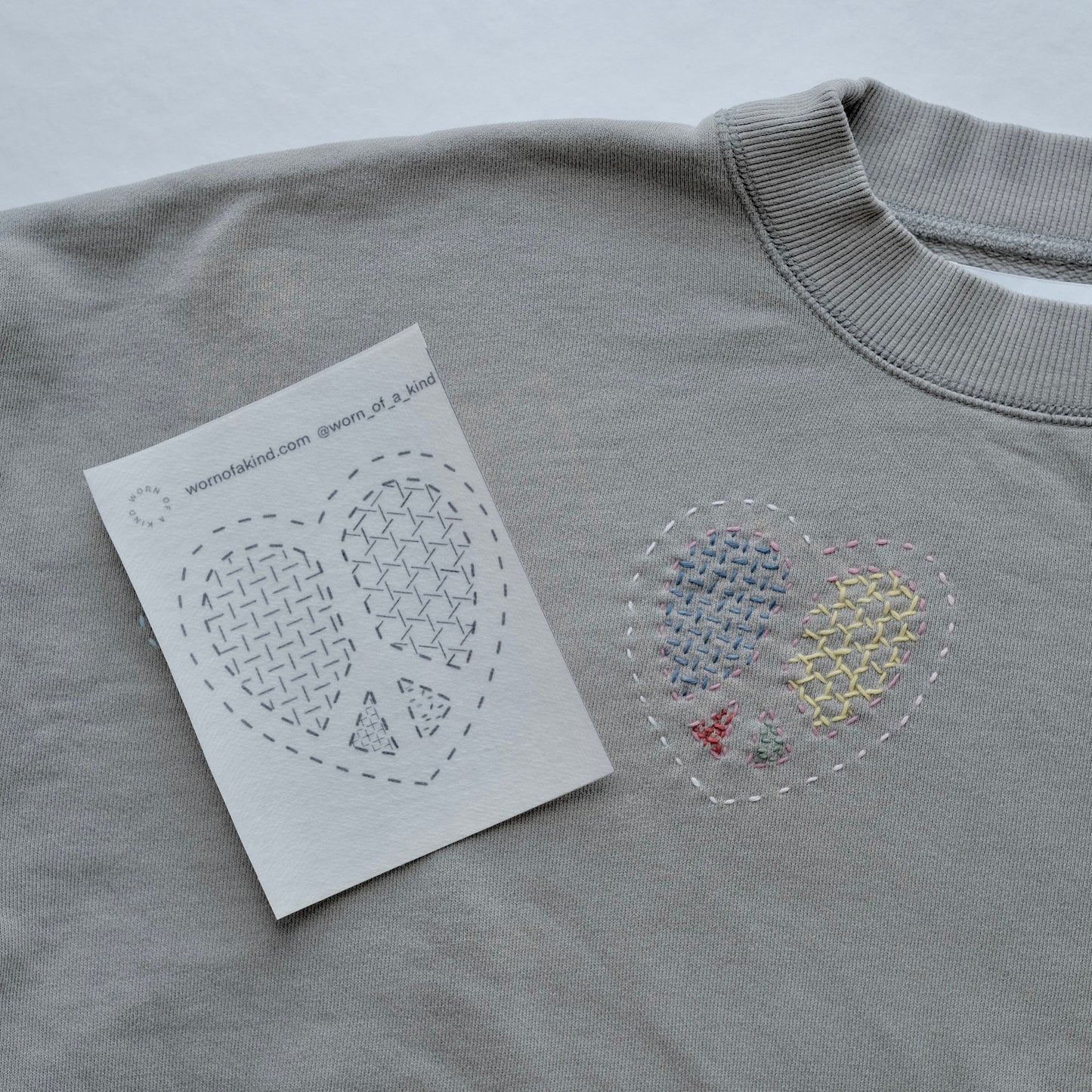 A single heart-shaped Sashiko transfer sticker from the Love Mends Valentine's Edition.