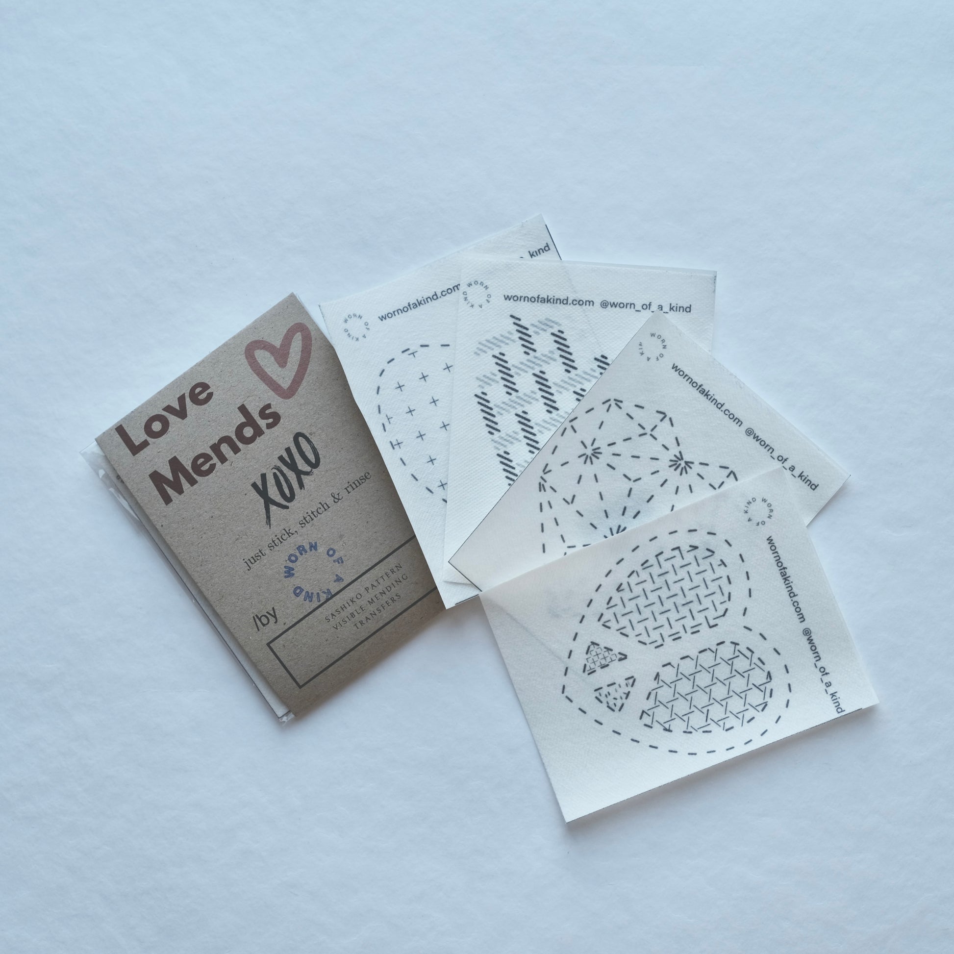 The full Love Mends set featuring 4 unique heart-themed Sashiko pattern transfers.