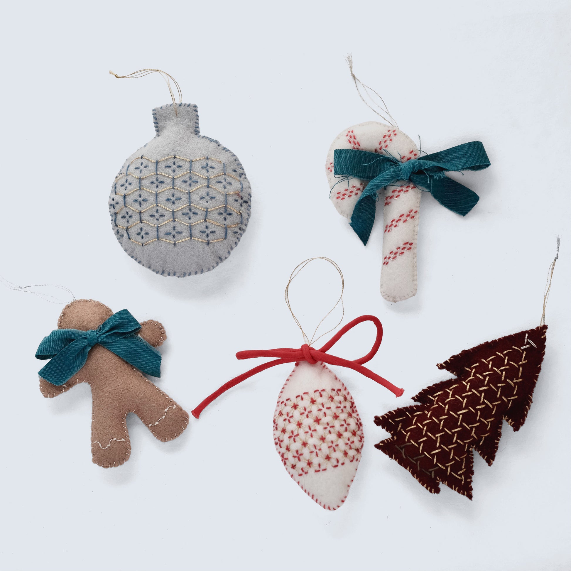 Digital PDF pattern for five hand-stitched Sashiko Christmas ornaments.