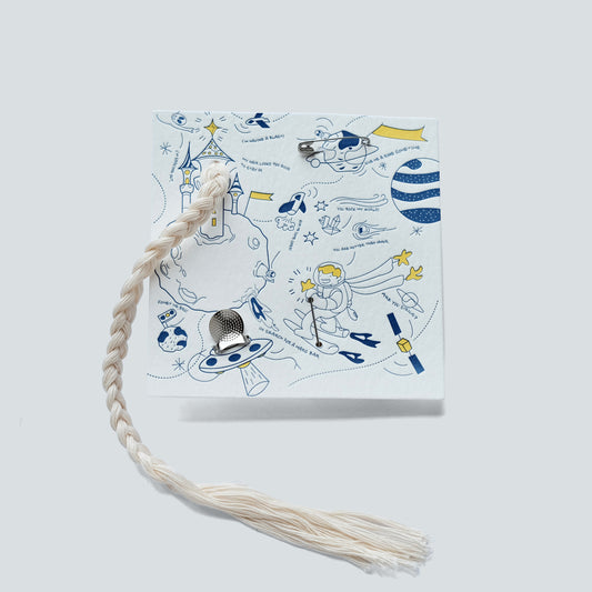 Sashiko Mending Starter Tool Kit featuring needles, thread, and thimble integrated into a space-themed letterpress card.