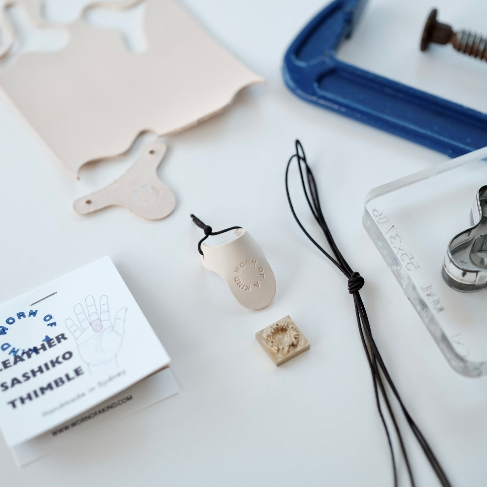 Makers tools: vachetta Leather, mold, metal logo stamp, and elastic used in our Sydney studio.