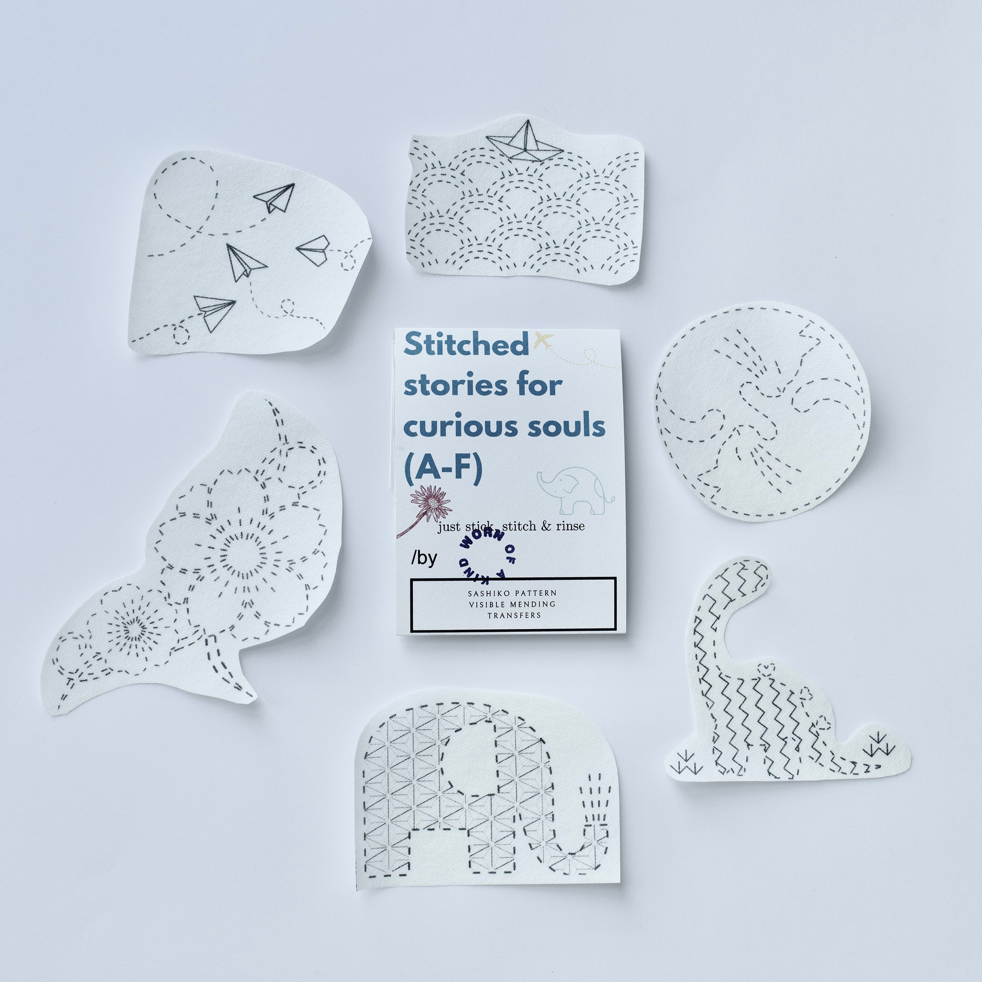 Flat lay of 6 water-soluble Sashiko transfers (A-F) and eco-friendly packaging.