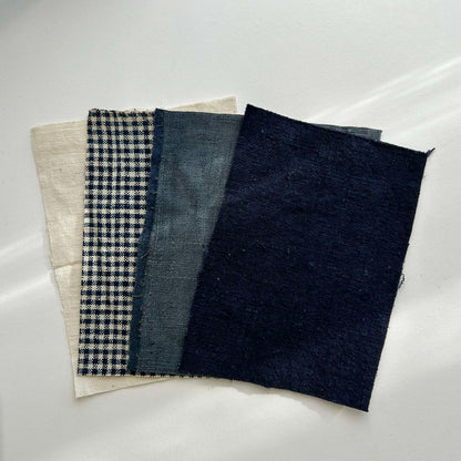 Four authentic vintage Boro patches in indigo, white, and checked patterns for traditional Japanese layering.